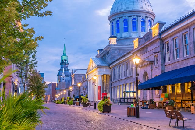 Old Town Montreal At Famous Cobbled Streets At Twilight In