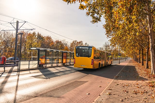 Germany Berlin November 3 2024. A Yellow Bus Travels Along