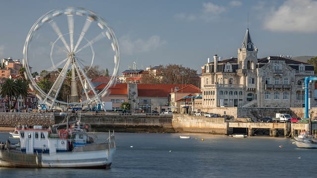 Boats And Yachts Floating On Water Of Cascais Bay With