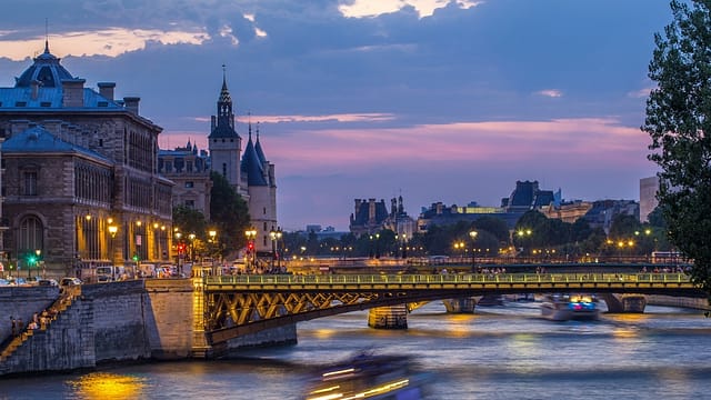 Le Pont D'arcole Bridge After Sunset With Boats Day To