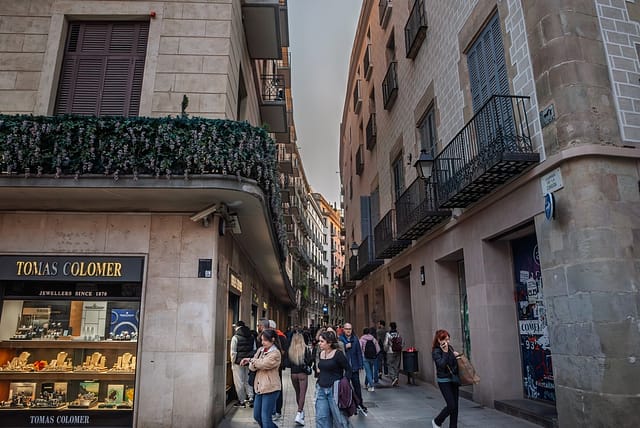 Barcelona Spain - April 5 2025: Crowded Narrow Street In