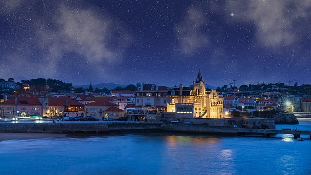 Cascais Portugal At Night. Palácio Seixas And Santa Marta Waterfront.